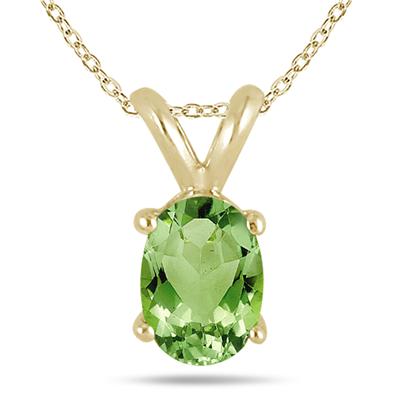 All-Natural Genuine 5x3 mm, Oval Peridot pendant set in 14k Yellow gold