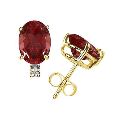 7X5mm Oval Garnet and Diamond Stud Earrings in 14K Yellow Gold