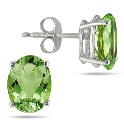 All-Natural Genuine 5x3 mm, Oval Peridot earrings set in 14k White Gold