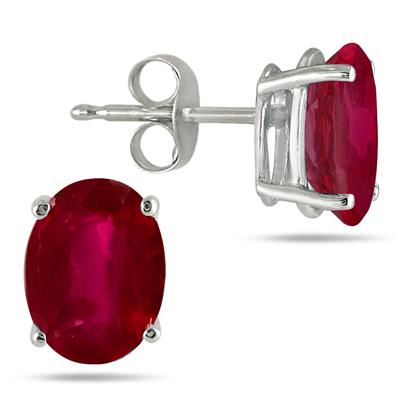 All-Natural Genuine 7x5 mm, Oval Ruby earrings set in Platinum