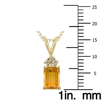 14K Yellow Gold 7x5MM Emerald Shaped Citrine and Three Stone Diamond Pendant