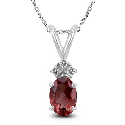 14K White Gold 8x6MM Oval Garnet and Three Stone Diamond Pendant