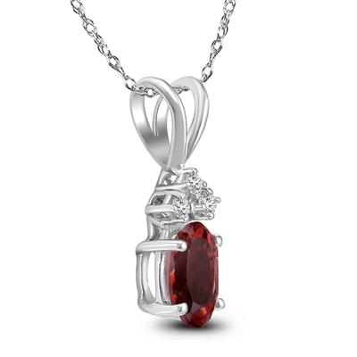 14K White Gold 8x6MM Oval Garnet and Three Stone Diamond Pendant