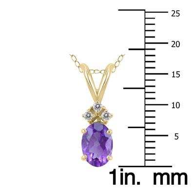 14K Yellow Gold 7x5MM Oval Amethyst and Three Stone Diamond Pendant