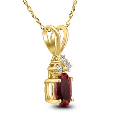 14K Yellow Gold 8x6MM Oval Garnet and Three Stone Diamond Pendant