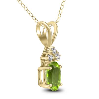 14K Yellow Gold 8x6MM Oval Peridot and Three Stone Diamond Pendant