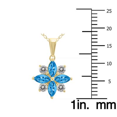 3/4 Carat TW Blue Topaz and Diamond Flower Pendant in 10K Yellow Gold