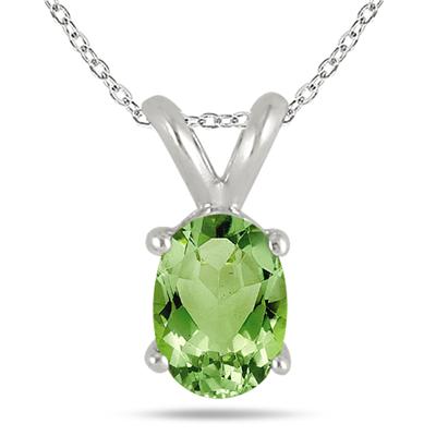 All-Natural Genuine 5x3 mm, Oval Peridot pendant set in Platinum