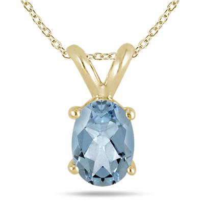 All-Natural Genuine 6x4 mm, Oval Aquamarine pendant set in 14k Yellow gold