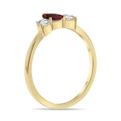 1/2 Carat TW Pear Shape Garnet and Diamond Ring in 10K Yellow Gold