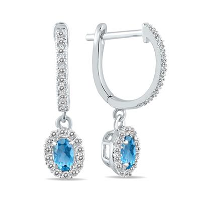 1/2 Carat Oval Blue Topaz and Diamond Halo Dangle Earrings in 10K White Gold