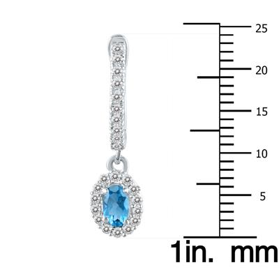 1/2 Carat Oval Blue Topaz and Diamond Halo Dangle Earrings in 10K White Gold