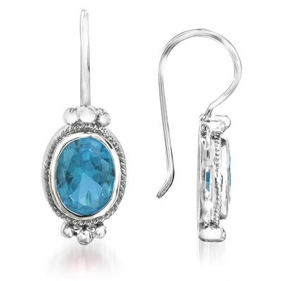 4.00 Carat Bezel Set Oval Shaped Blue Topaz Earrings in .925 Sterling Silver