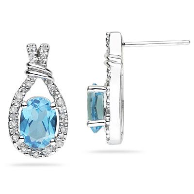 Blue Topaz & Diamonds Oval Shape Earrings in White Gold