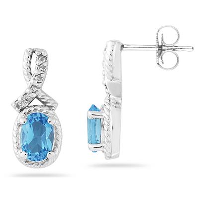 Oval Shaped Blue Topaz and Diamond Earrings in White Gold