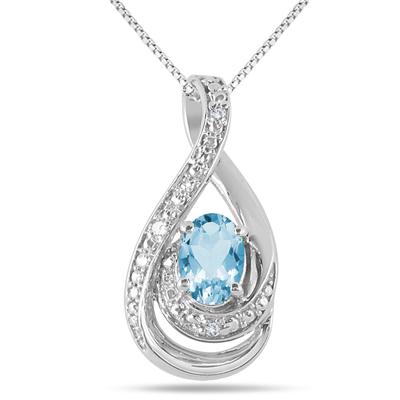 7x5 MM Blue Topaz and Diamond Pendant in .925 Sterling Silver