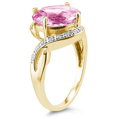 Oval Shaped Pink Topaz and Diamond Curve Ring in 10K Yellow Gold