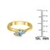 5X3MM Aquamarine and Diamond Twist Ring in 10K Yellow Gold